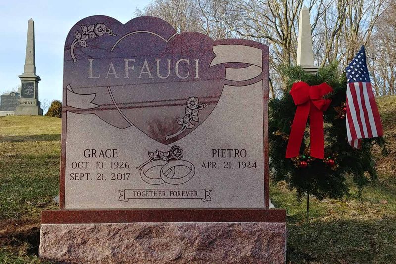 Illustrated Red Granite Monument