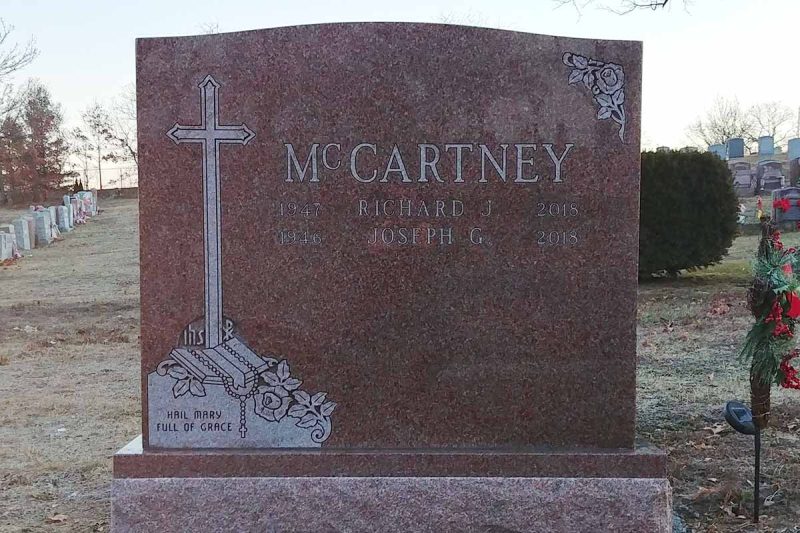 Red Granite Monument with Cross